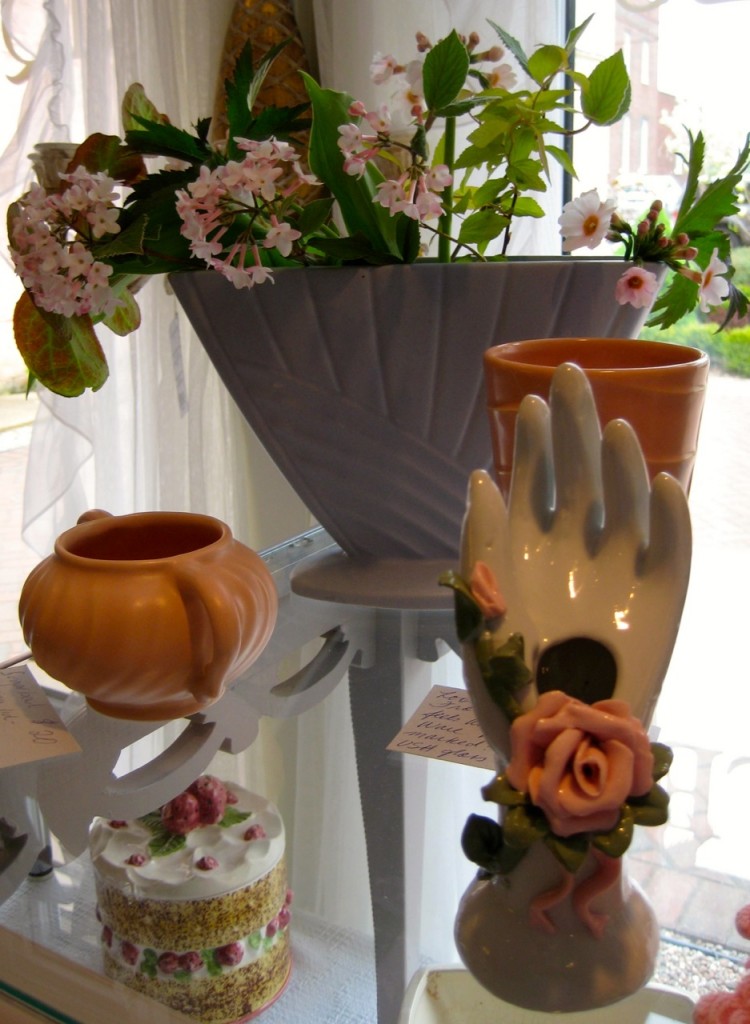 Beautiful deco vase ($55), hand vase ($10). strawberry cookie jar ($18), pink sugar bowl - Fransican Coronado ($20) 