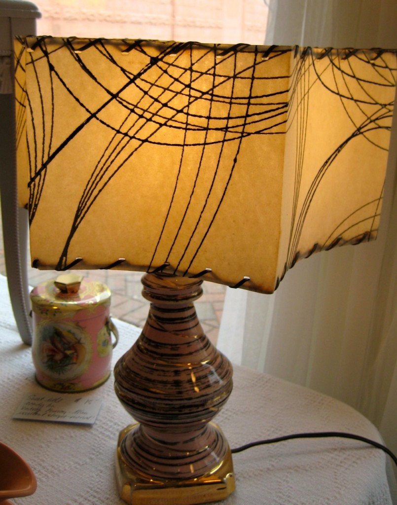 Pinky and gold swirly lamp with original fibreglass shaw ($95).