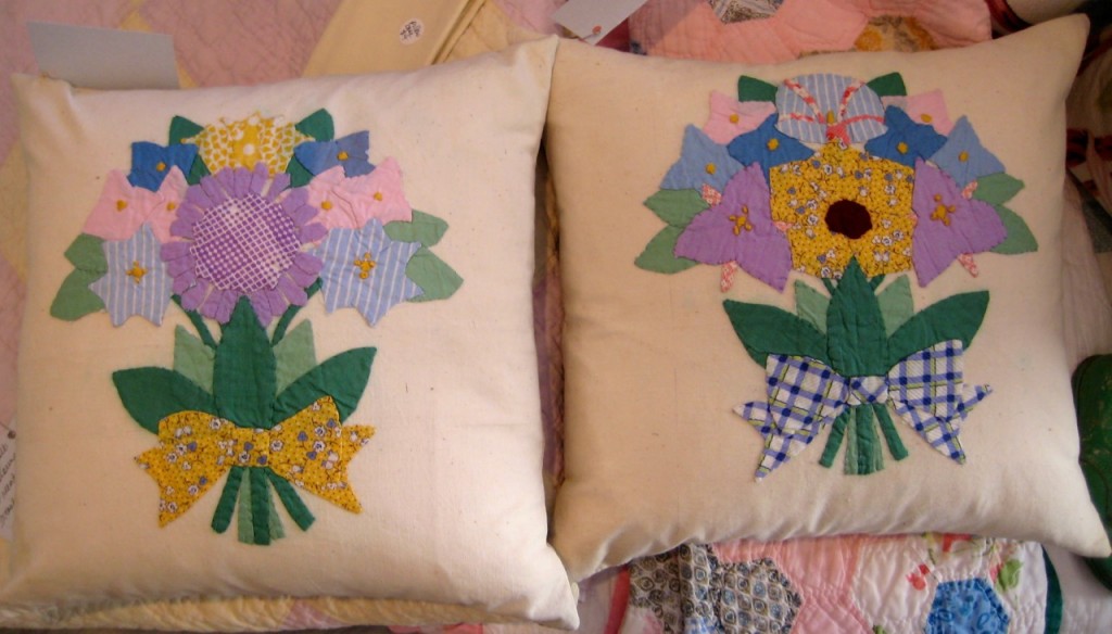 Pair of vintage appliqued flower bouquets. New inserts and  new striped cotton backing fabric $85 for the pair.