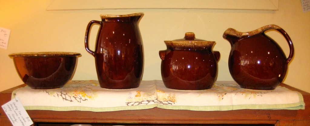 Set of three nesting bowls $20 Large pitcher $25 Bean crock $25 Ball pitcher with ice guard $25